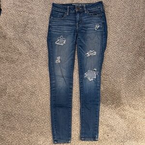 AE Dark Blue Distressed Skinny Jeans